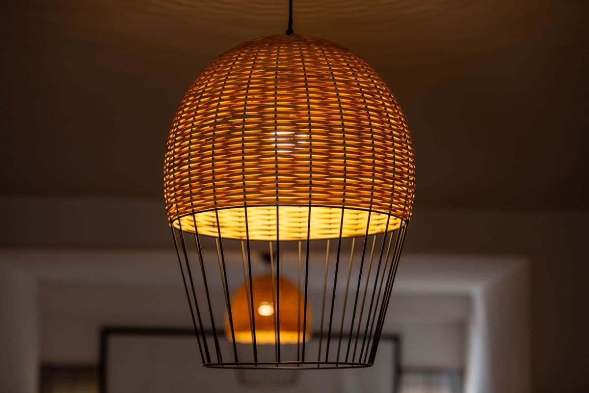 Cane Pendant Lamp, lit, showing shadow pattern